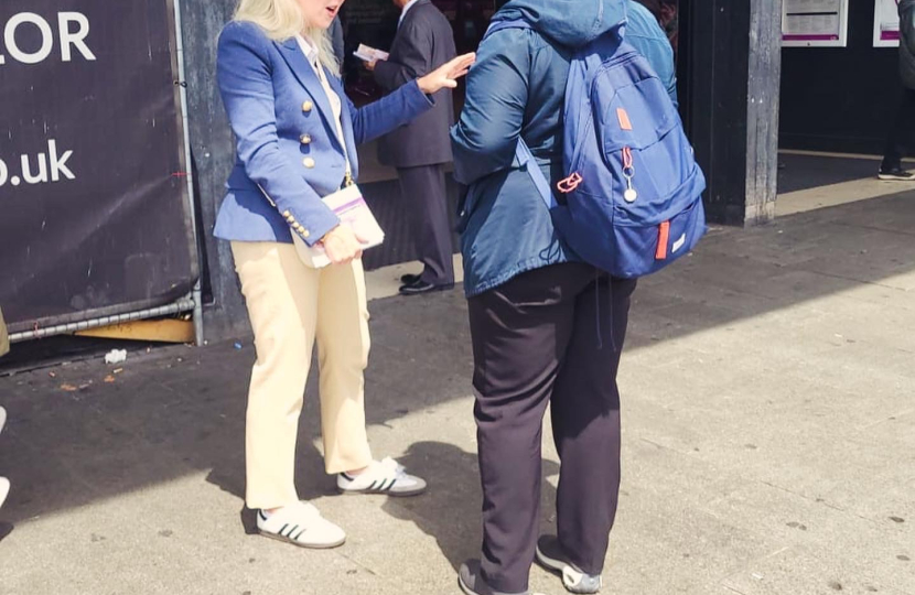 speaking to residents in Barking station